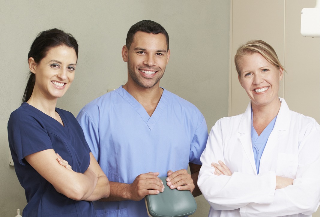 bigstock-Portrait-Of-Dentist-And-Dental-92589221